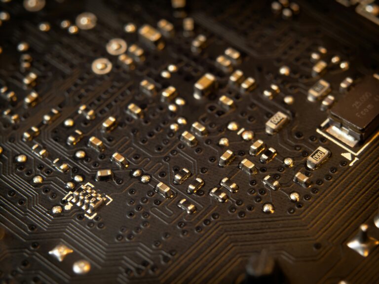 Detailed view of a circuit board showing various electronic components and traces.